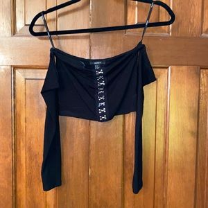 Black cropped long sleeve off the shoulder shirt